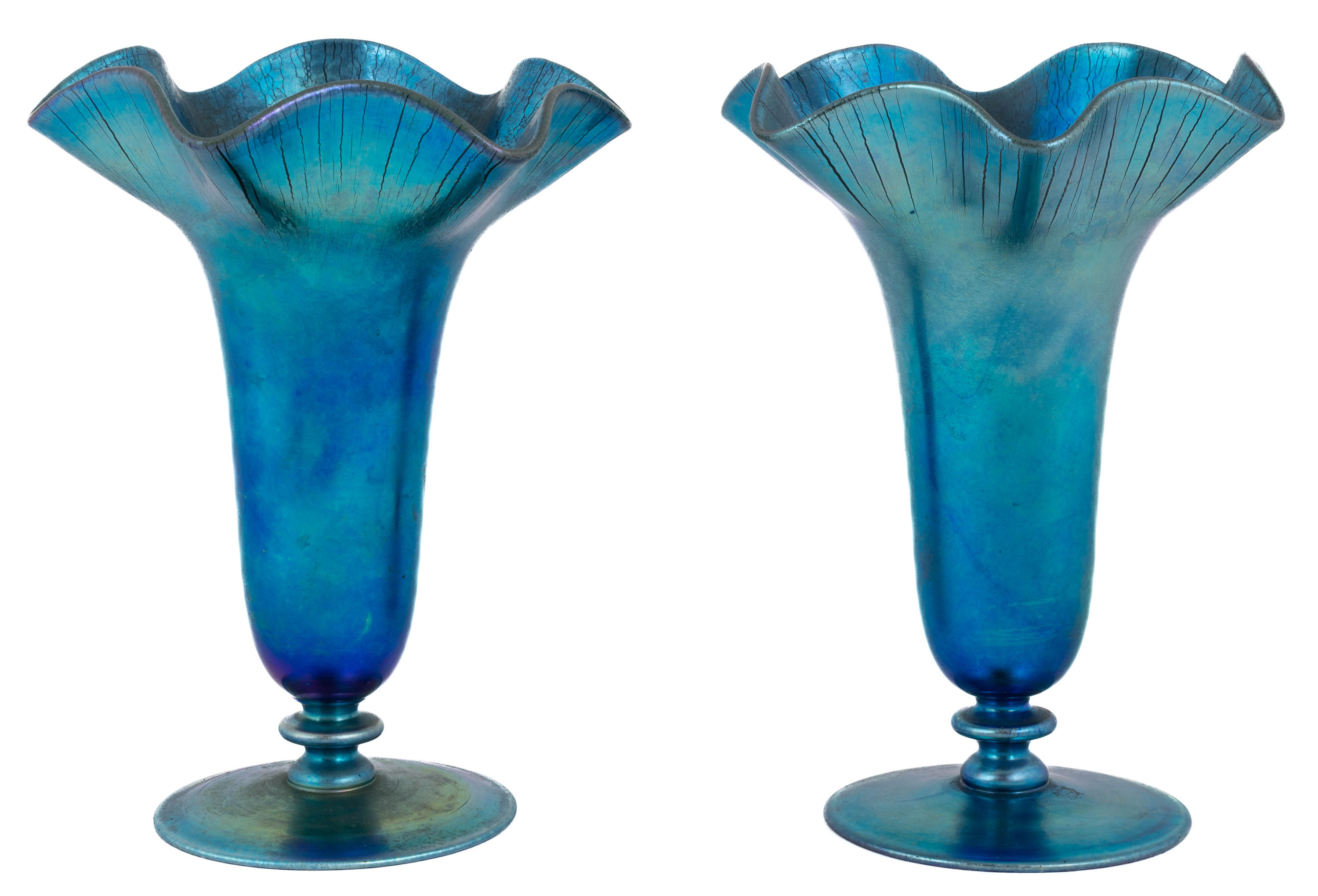 Appraisal: PAIR OF STEUBEN BLUE AURENE WITH RUFFLED TOP Corning NY