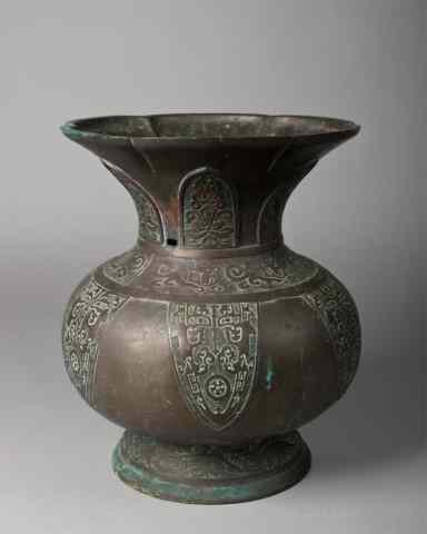 Appraisal: A Large Japanese Bronze UrnFinely molded with lotus shaped rim