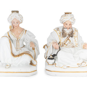 Appraisal: A Pair of Jacob Petit Porcelain Figural Candlesticks th Century