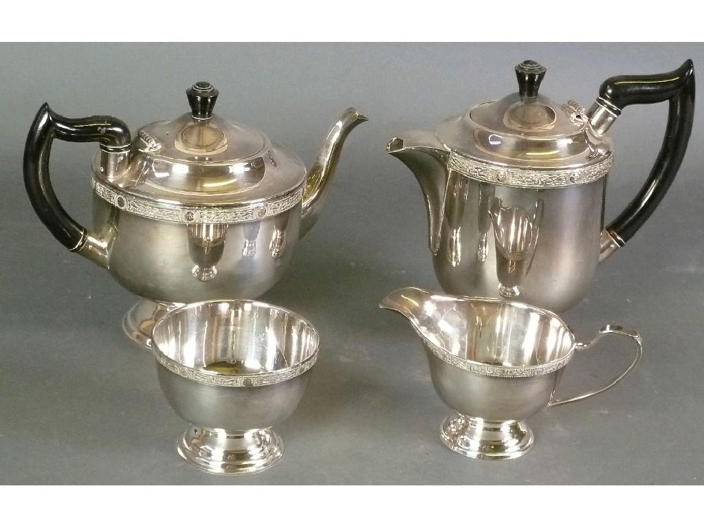 Appraisal: FOUR PIECE ELECTROPLATED PEDESTAL TEASET by Viners with black angular