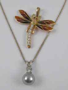 Appraisal: A yellow metal marked ct gold and enamel dragonfly pendant