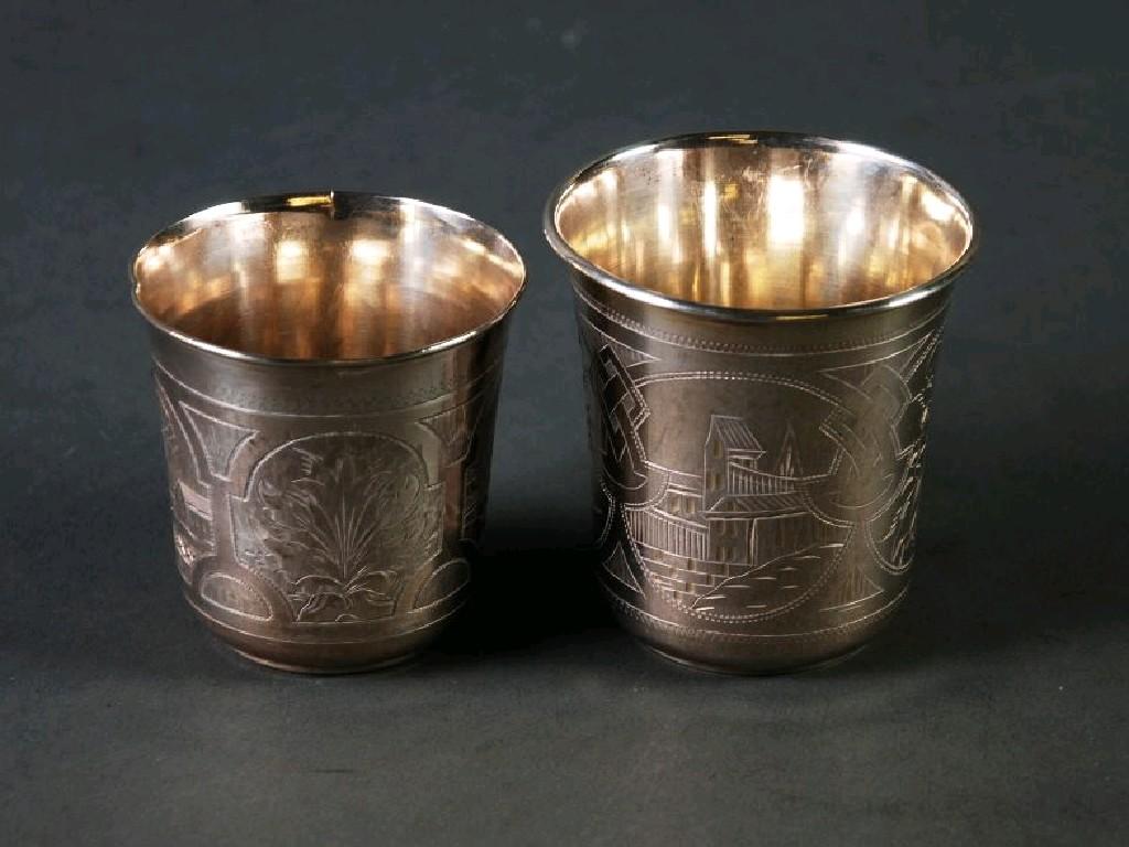 Appraisal: TWO LATE NINETEENTH CENTURY RUSSIAN SILVER VODKA CUPS each engraved