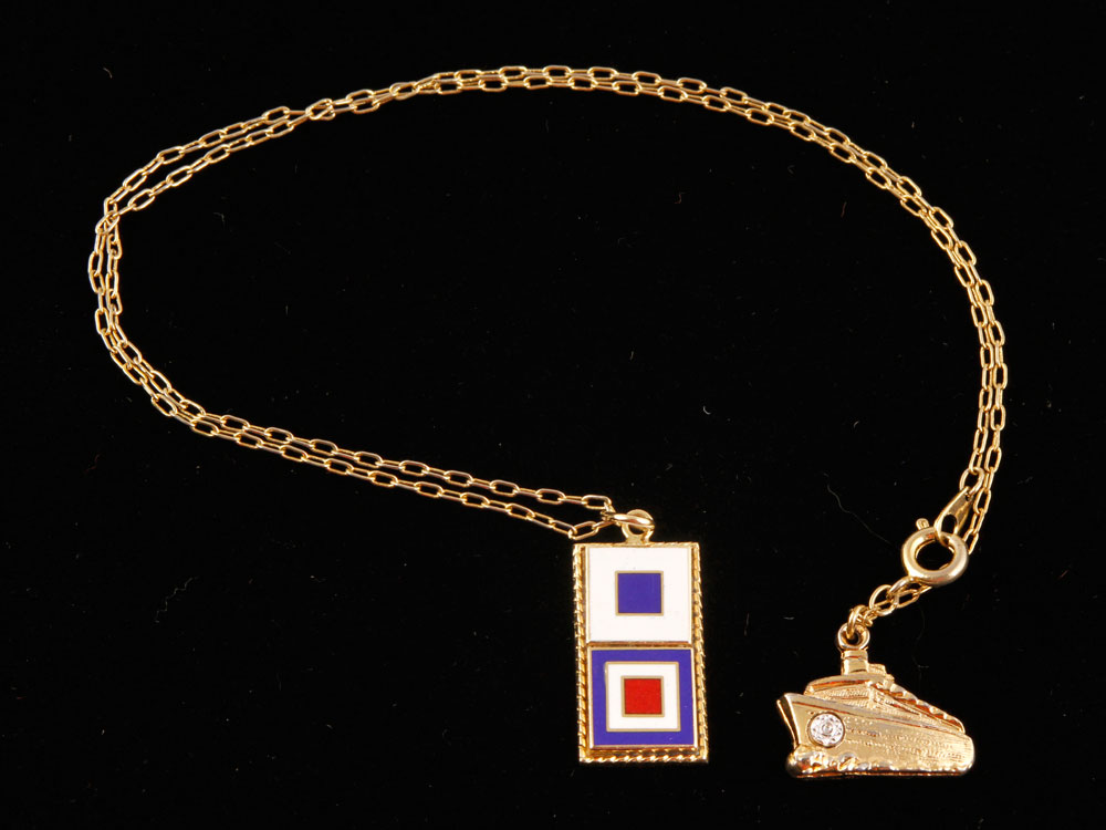 Appraisal: - K Gold Charm Necklace K yellow gold charm necklace