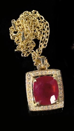 Appraisal: Dramatic Lady's Fourteen-Karat Yellow Gold Ruby and Diamond Pendant Necklace