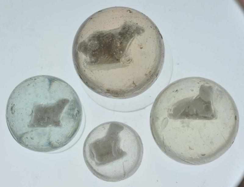 Appraisal: Lot of Sulphide Marbles Description Smallest marble is a standing