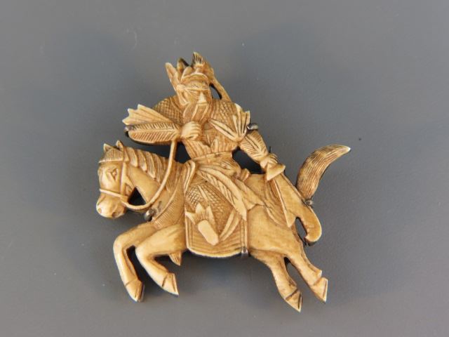 Appraisal: Chinese Carved Ivory Brooch warrior on horseback sterling silver back