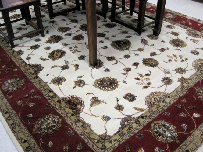 Appraisal: ORIENTAL SILK AND WOOL CARPET Indo-Persian hand knotted overall floral