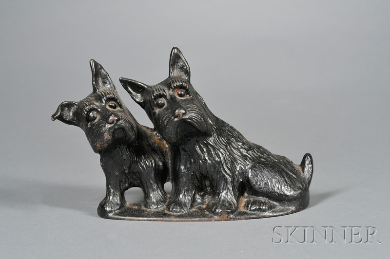 Appraisal: Cast Iron Scottish Terrier Doorstop and Bull Terrier Bookends America