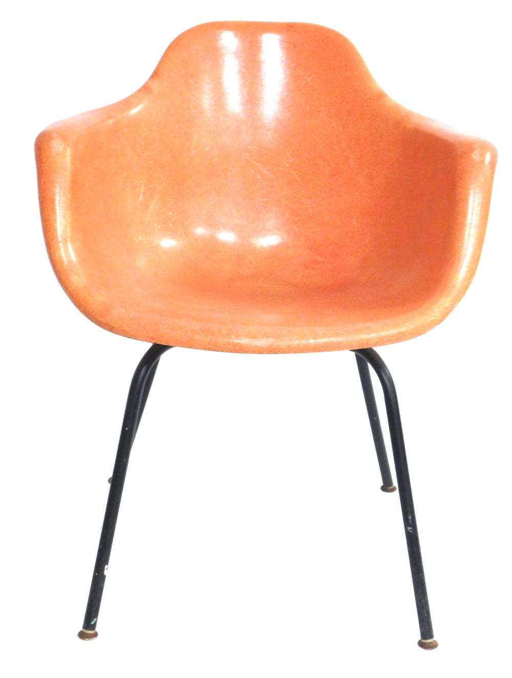 Appraisal: Mid-century modern Krueger Metal Products Eames style chair orange fiberglass