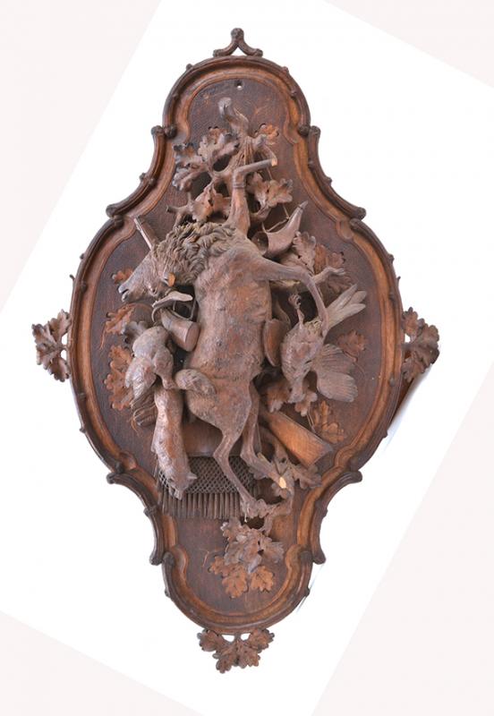 Appraisal: A CARVED BLACK FOREST HUNTING WALL PLAQUE