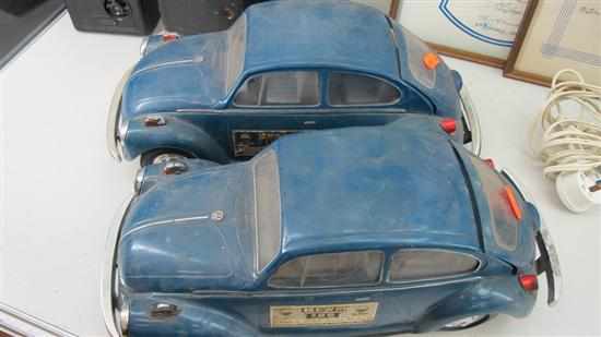 Appraisal: TWO JIM BEAM VOLKSWAGON BEETLE DECANTERS ONE EMPTY