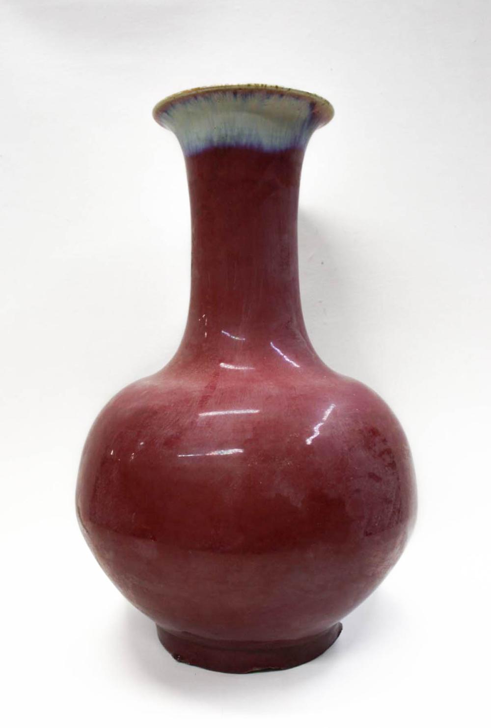 Appraisal: CHINESE FLAMBE GLAZED POTTERY VASE of bulbous form with flared