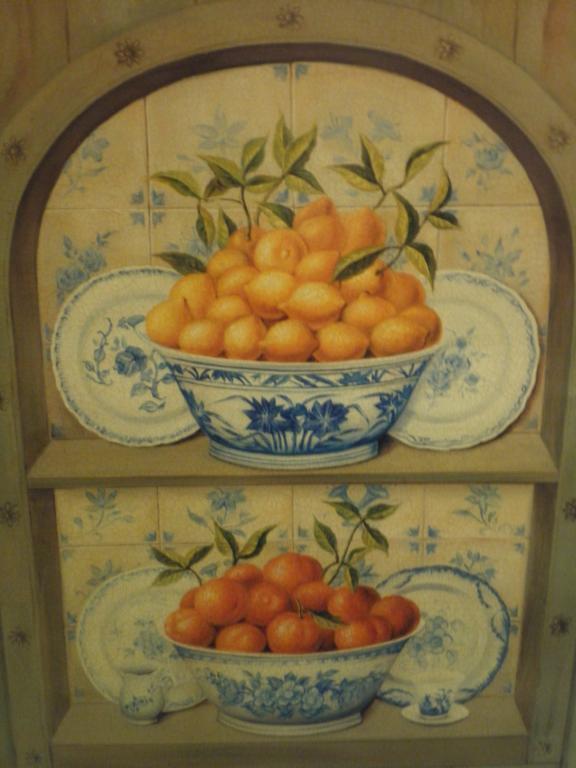 Appraisal: A pair of reproduction prints on canvas Fruit Still Lives