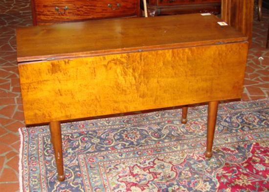 Appraisal: American maple drop-leaf table circa rectangular top with drop leaves