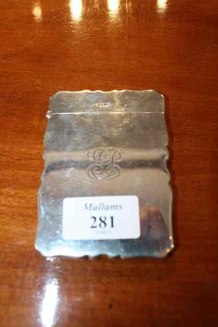 Appraisal: A SILVER CARD CASE plain with shaped edges long Birmingham