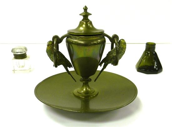 Appraisal: Three inkwells urn-shaped brass inkwell on charger with glass insert