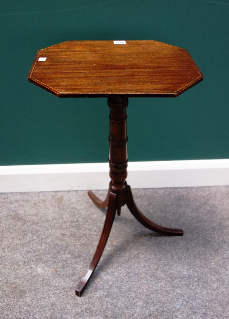 Appraisal: An early th century brass inlaid mahogany occasional table the