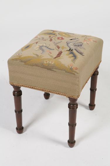 Appraisal: A VICTORIAN STOOL with needlework upholstered seat on four turned