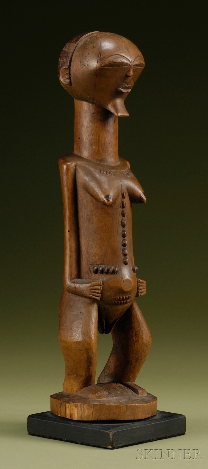 Appraisal: African Carved Wood Female Figure Songye standing with bent knees