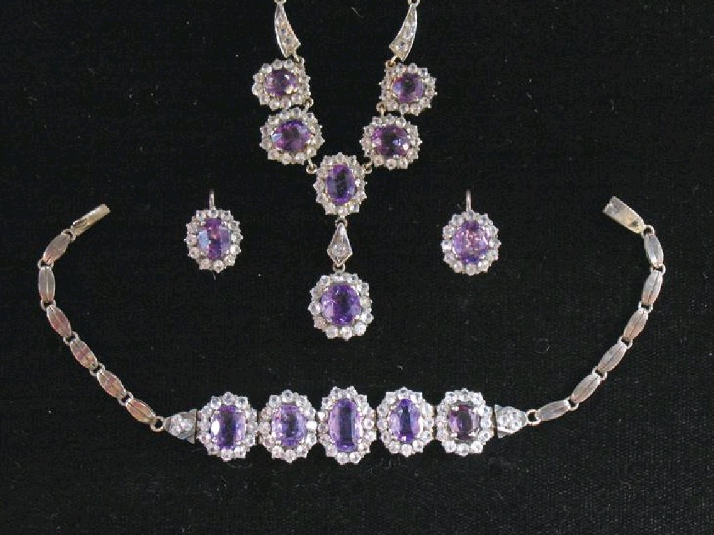 Appraisal: AN AMETHYST AND WHITE SAPPHIRE DEMI-PARURE the necklace comprising five