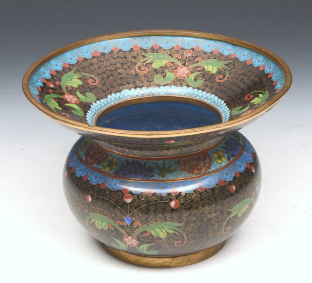 Appraisal: A JAPANESE BLACK GROUND CLOISONN SPITTOON ovoid shape with inlaid