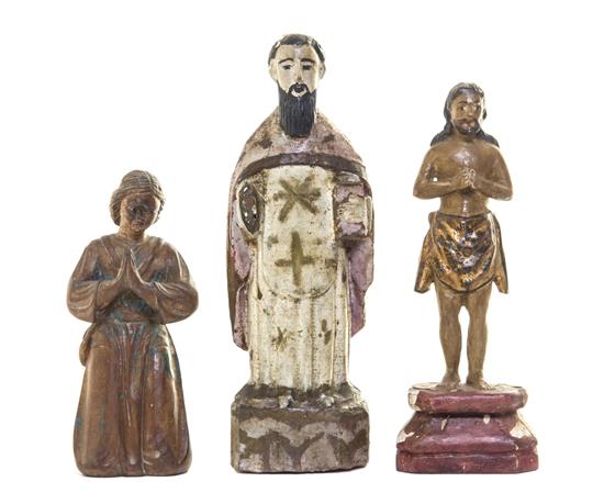 Appraisal: Sale Lot Three South American Santos Figures th century and