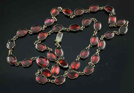 Appraisal: A Victorian ct gold and foiled garnet necklace in Estimate