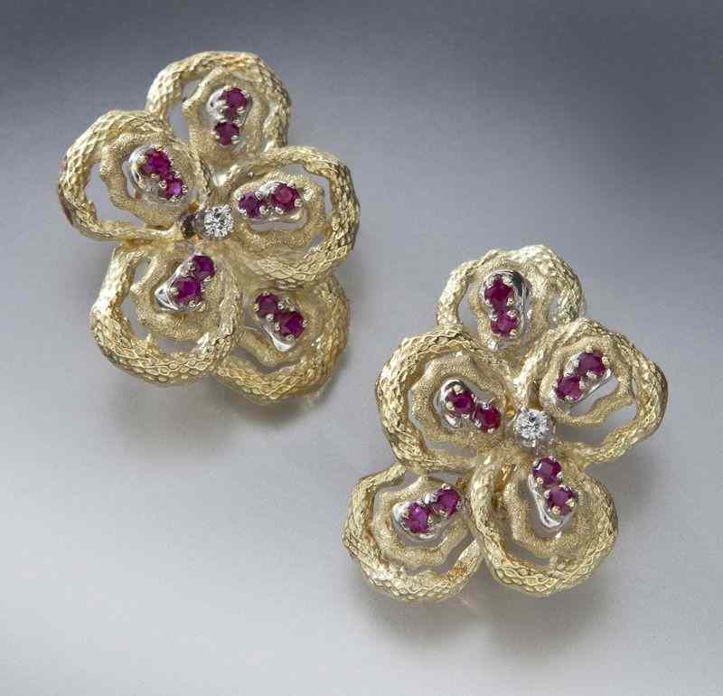 Appraisal: Pr K gold diamond and ruby earringsmounted with two round