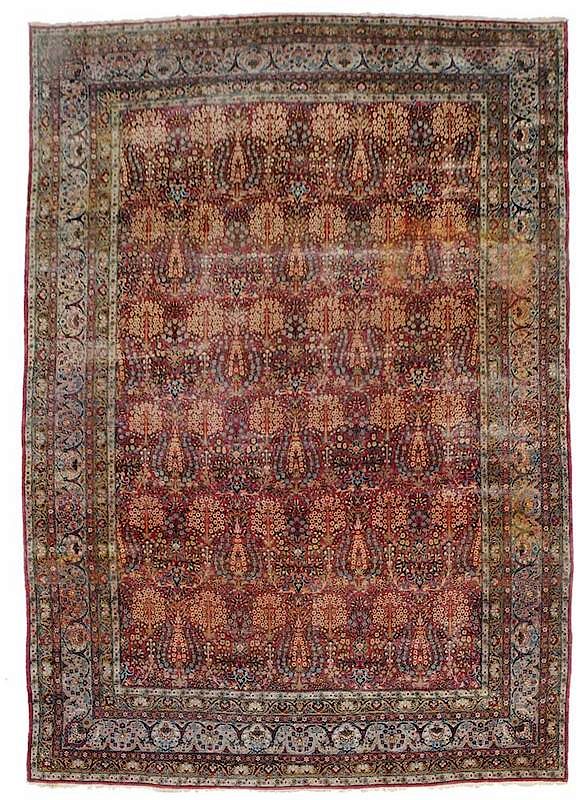 Appraisal: Kerman Carpet overall floral and tree design on raspberry field