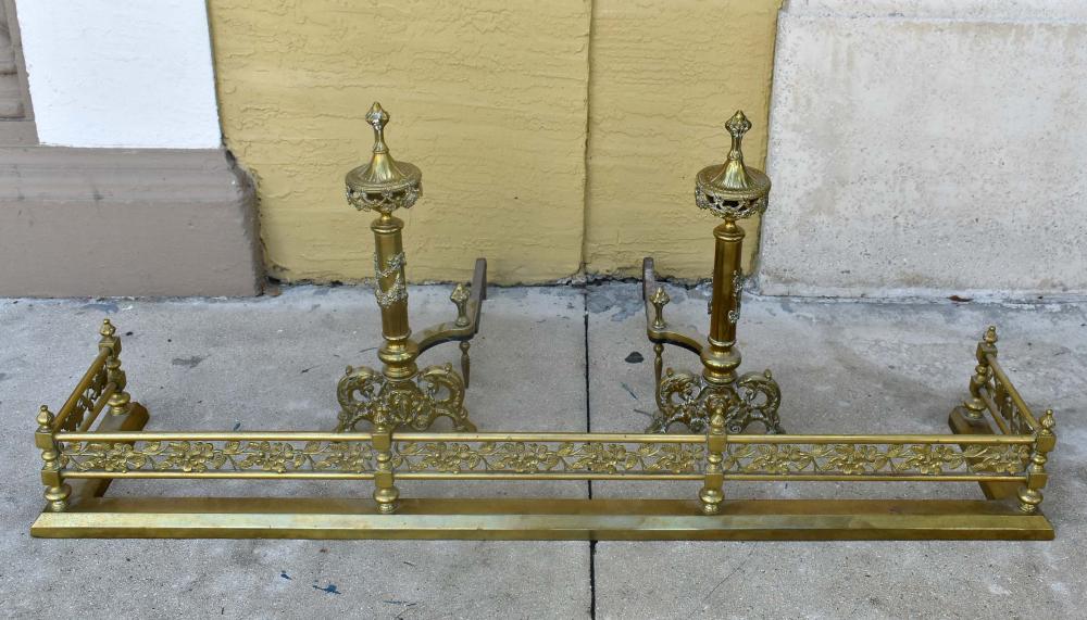 Appraisal: PAIR OF BRASS ANDIRONS AND A FENDERProbably French The andirons