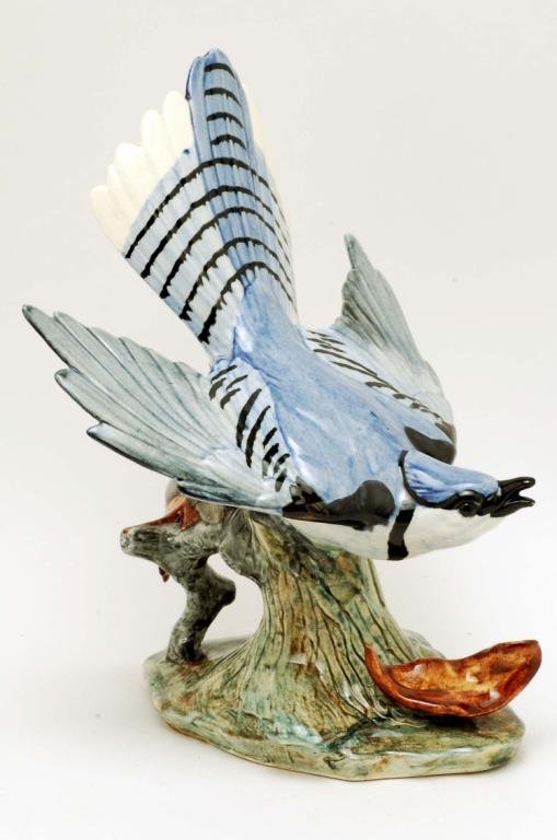 Appraisal: Stangl flying blue jay with leaf Marked Stangl Pottery AL