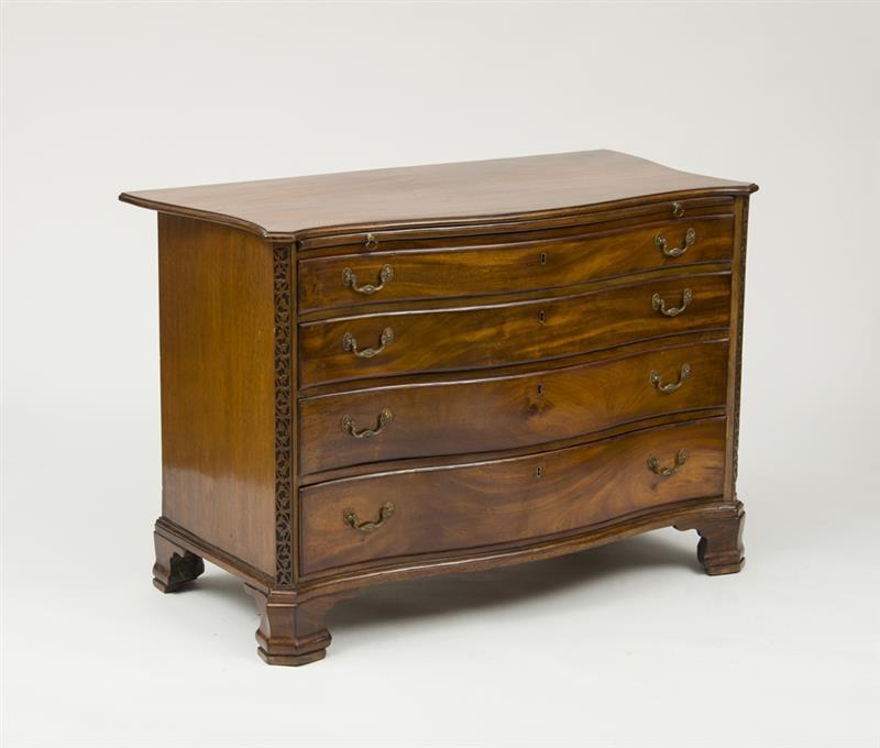 Appraisal: GEORGE III MAHOGANY SERPENTINE-FRONTED CHEST OF DRAWERS With an overhanging