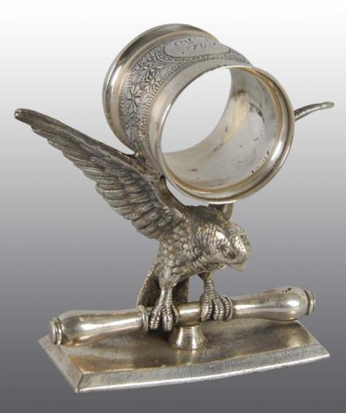 Appraisal: Large Eagle Figural Napkin Ring on Knife Rest Description Rogers