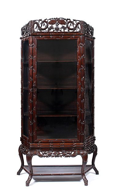 Appraisal: A Chinese rosewood display cabinet th Centurywith glazed hinged door