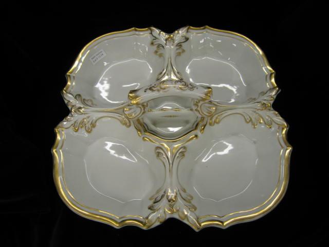 Appraisal: Fine Porcelain Divided Server gold trim center handle six port