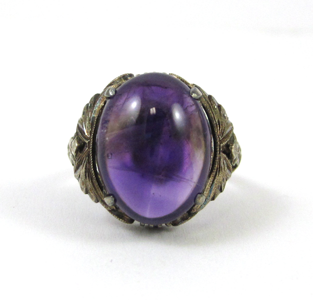 Appraisal: AMETHYST AND FOURTEEN KARAT WHITE GOLD RING set with a