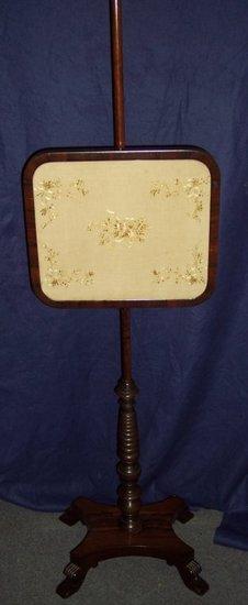 Appraisal: A William IV rosewood pole screen with silk needlework panel