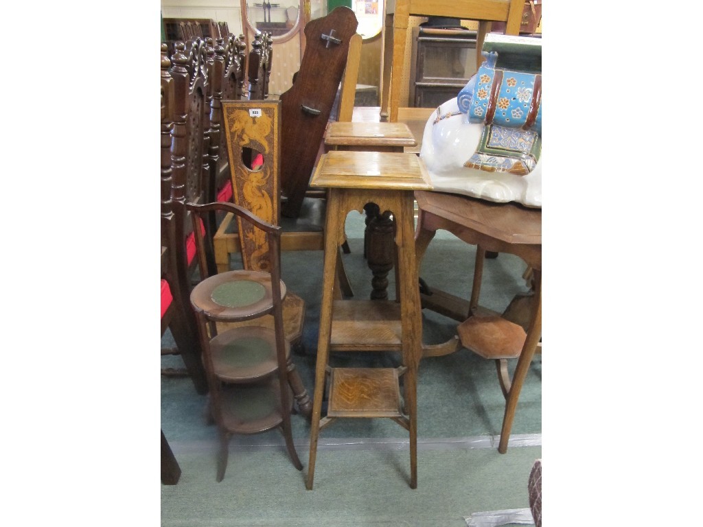 Appraisal: Pokerwork spinning chair two plantstands cakestand occasional table camel garden