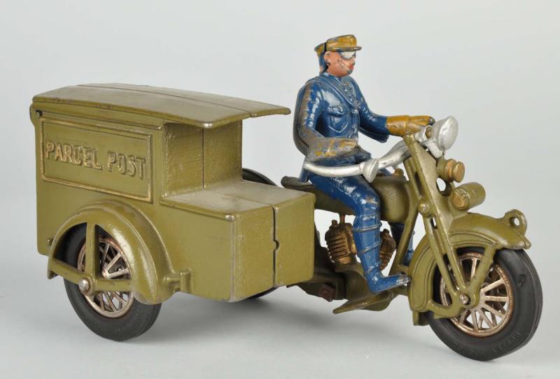 Appraisal: Cast Iron Hubley Parcel Post Motorcycle Toy Includes original driver