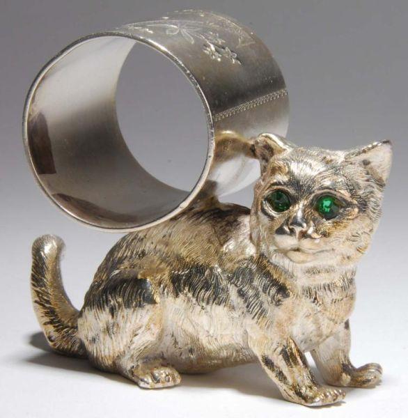 Appraisal: Cat with Glass Eyes Figural Napkin Ring Description Large cat