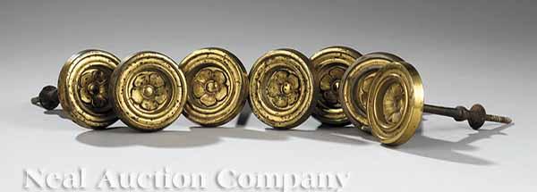 Appraisal: A Set of Seven American Classical Brass Tie Backs early