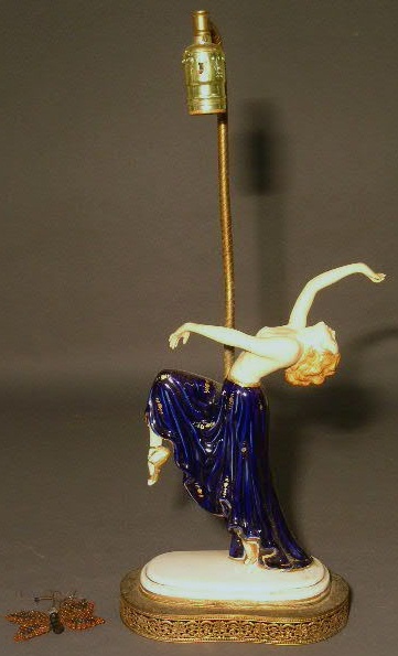 Appraisal: Porcelain Art Deco lamp of a semi nude female dancer