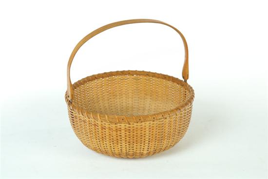 Appraisal: NANTUCKET BASKET American th century Turned wooden base and bentwood