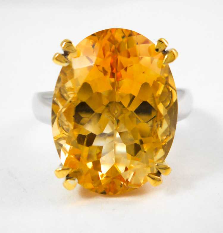 Appraisal: CITRINE AND FOURTEEN KARAT GOLD SOLITAIRE RING The white gold