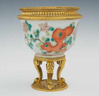 Appraisal: A Chinese Bowl in Ormolu Early th Century White porcelain