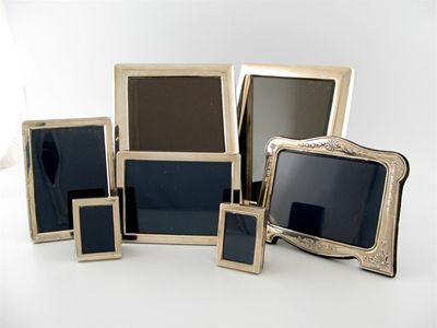 Appraisal: A small collection of seven modern silver photograph frames various