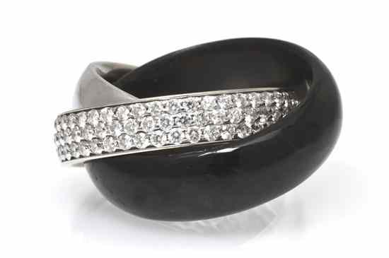 Appraisal: An Karat White Gold Diamond and Onyx Rolling Rings consisting