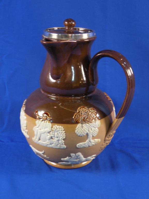 Appraisal: A Royal Doulton stoneware coffee pot and lid with a