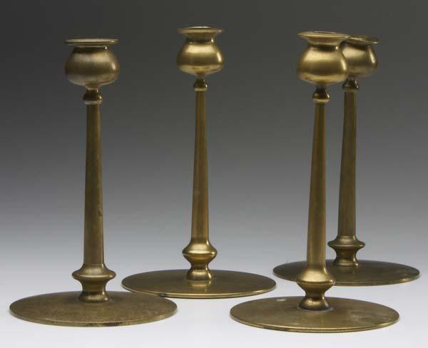 Appraisal: JARVIE STYLE Two pairs of brass candlesticks Bent bobeche to