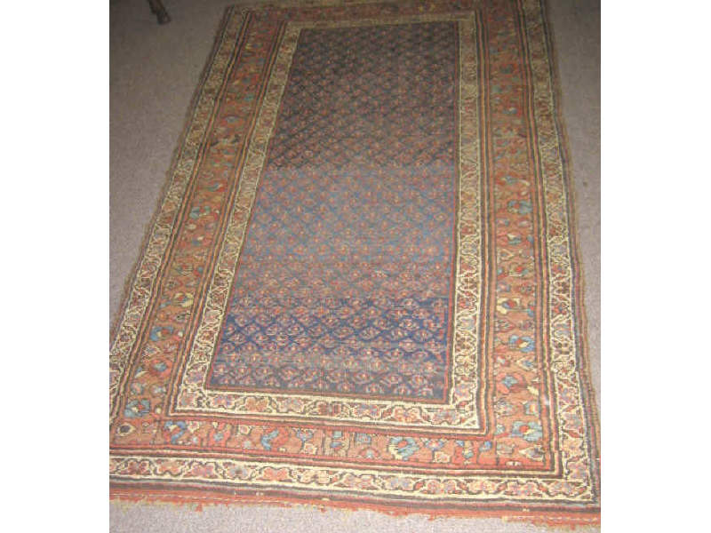 Appraisal: KURDISH AREA RUG The indigo field shows an allover pattern